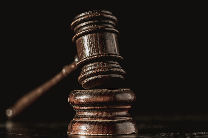 Image of courtroom gavel for the Erectimus Terms of Service page