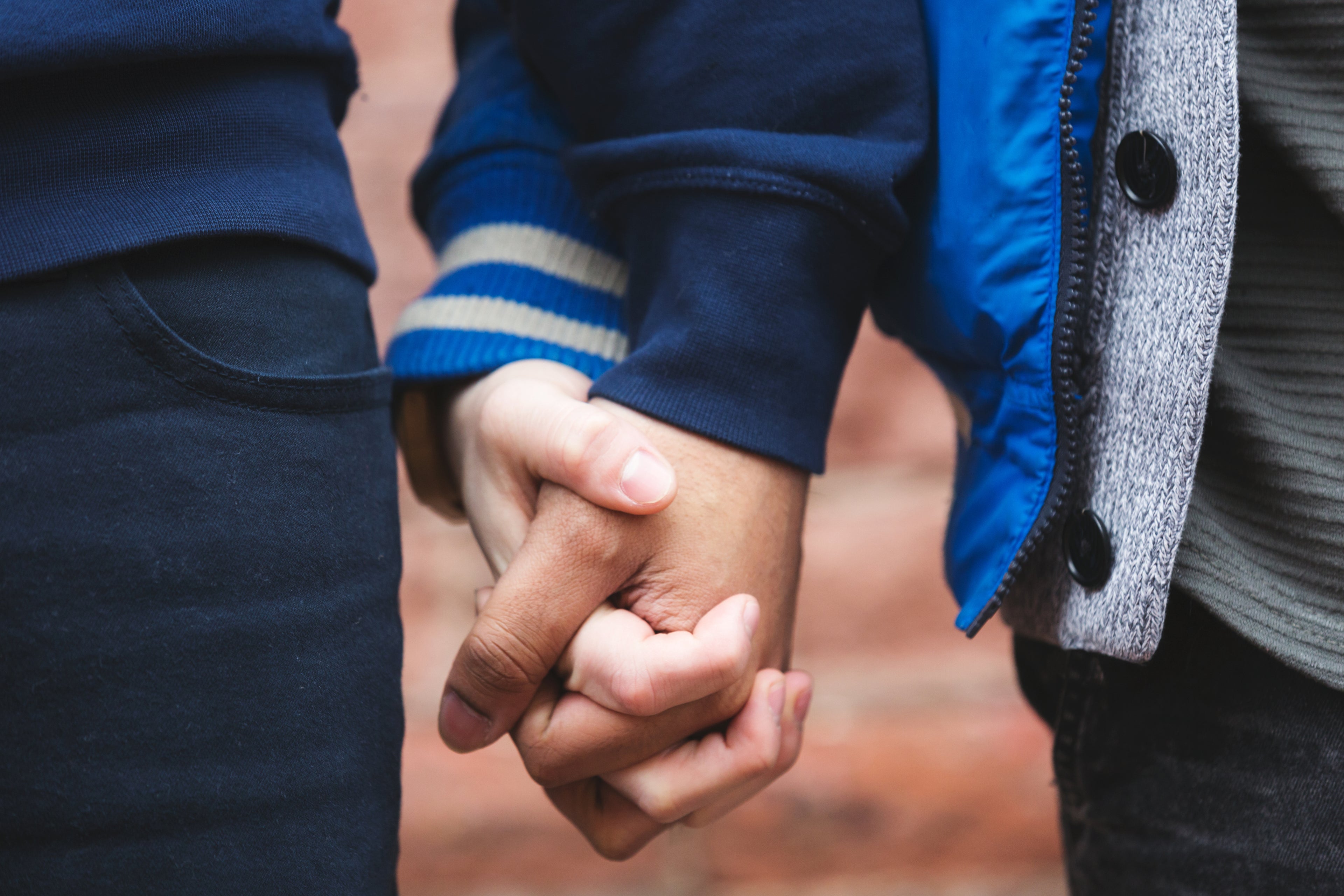 Close up of a couple holding hands
