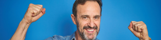 Confident mature man celebrating male vitality and sexual wellness